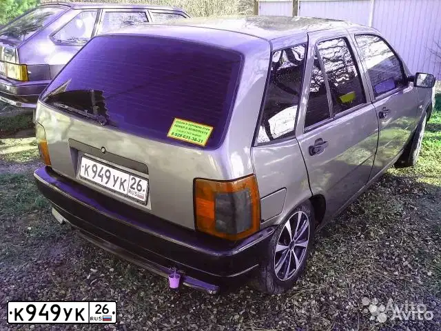 Фото автомобиля FIAT TIPO, 1993 — госномер К949УК26. Цвет: ЧЕРНЫЙ