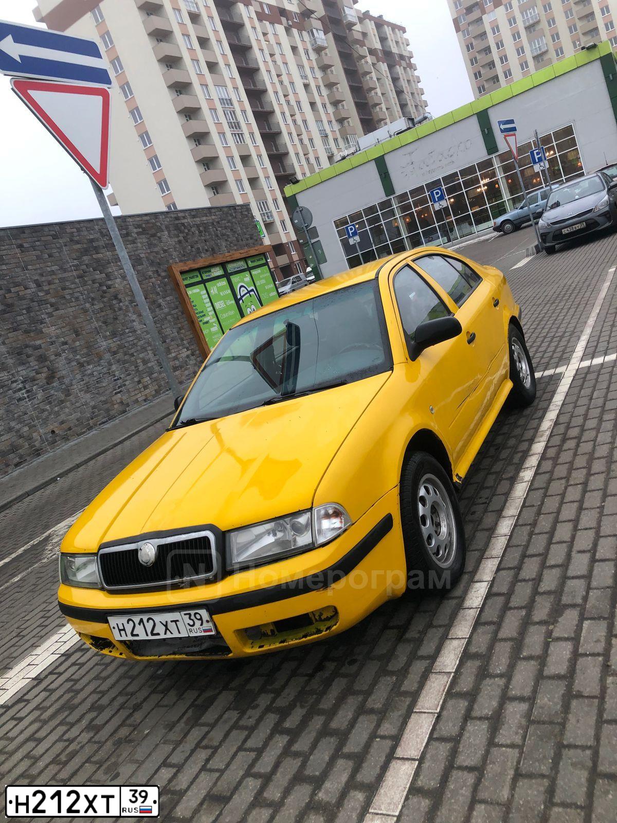 Фото автомобиля SKODA OCTAVIA, 1998 — госномер Н212ХТ39. Цвет: ЖЕЛТЫЙ