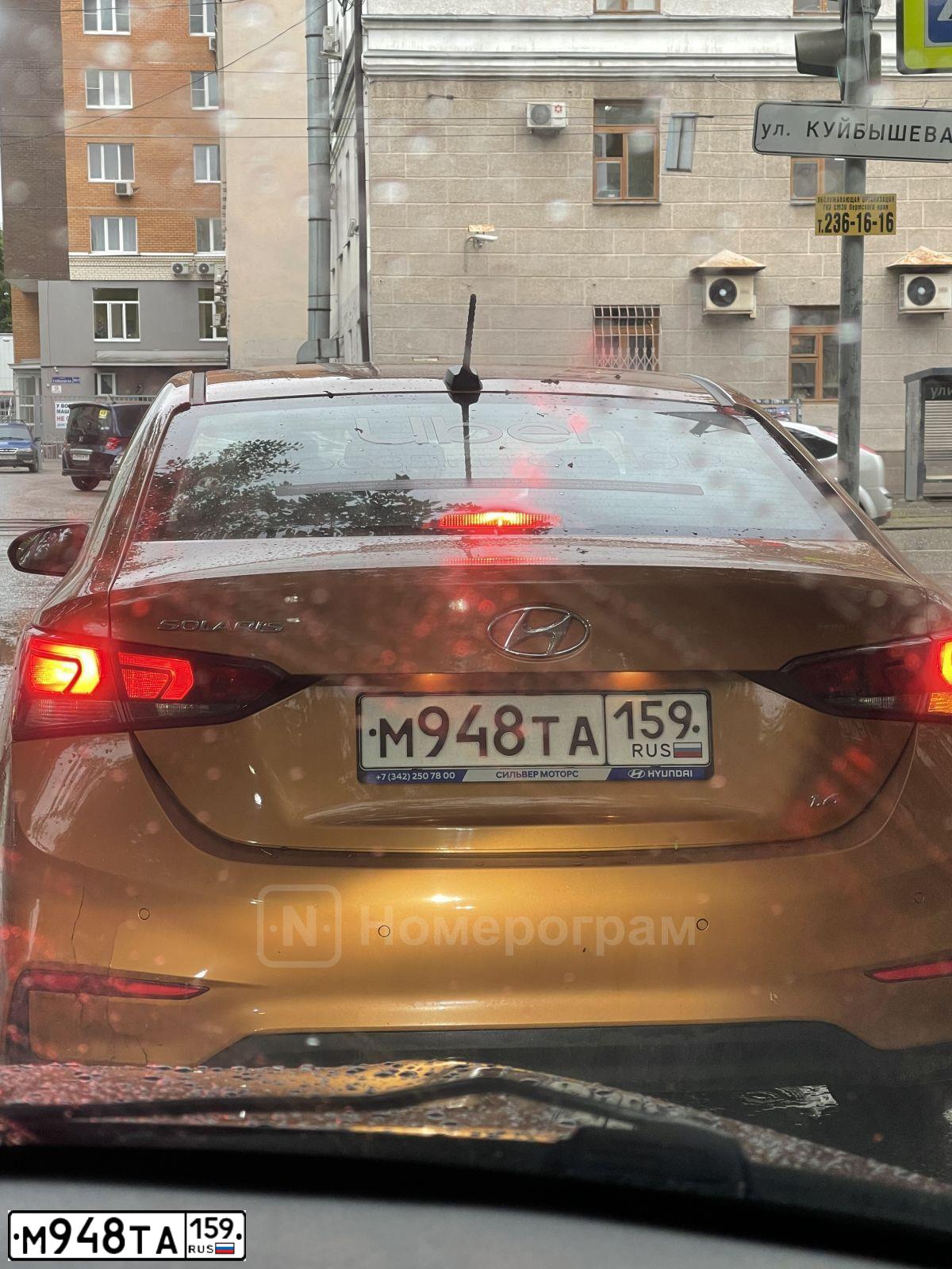 Фото автомобиля HYUNDAI SOLARIS, 2019 — госномер Р028МР159. Цвет: Оранжевый