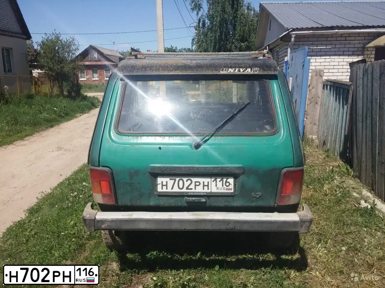 Фото автомобиля LADA 2121 NIVA, 1998 — госномер Н702РН116. Цвет: ЗЕЛЕНЫЙ