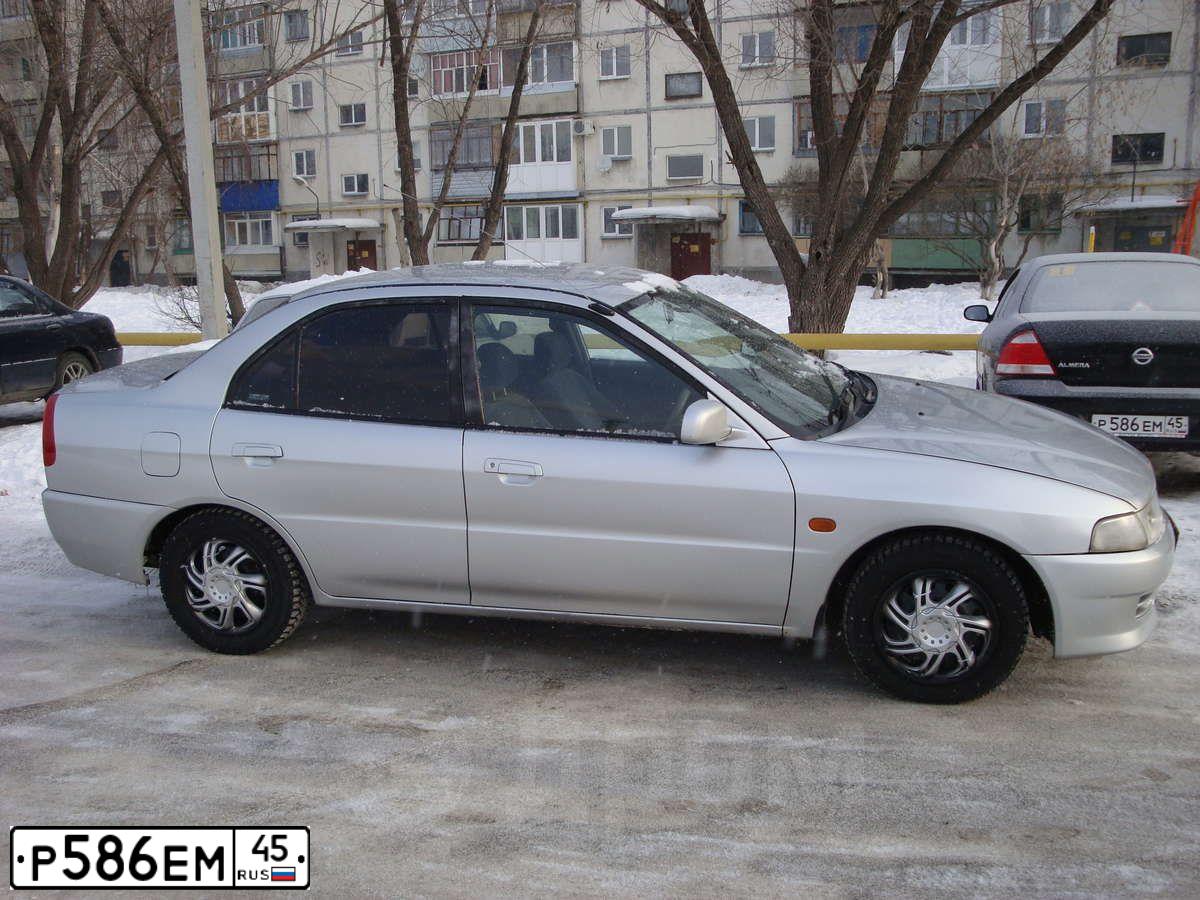 Фото автомобиля NISSAN ALMERA, 2007 — госномер Р586ЕМ45. Цвет: ЧЕРНЫЙ