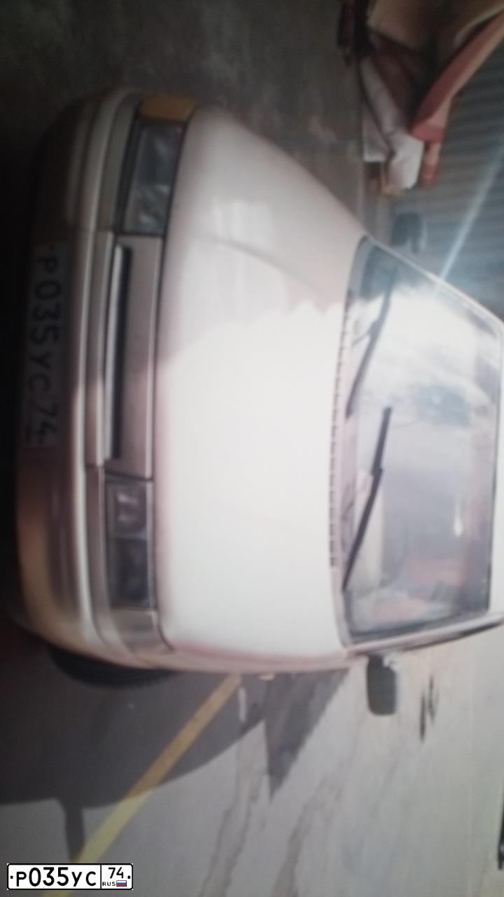 Фото автомобиля LADA 2112, 2000 — госномер Р035УС74. Цвет: СЕРЕБРИСТО-ЗОЛОТОЙ