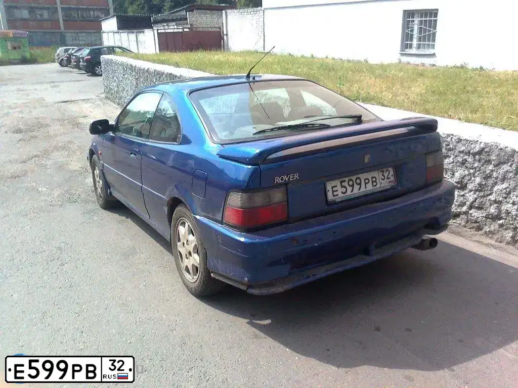 Фото автомобиля ROVER 200-SERIE, 1992 — госномер Е599РВ32. Цвет: СИНИЙ