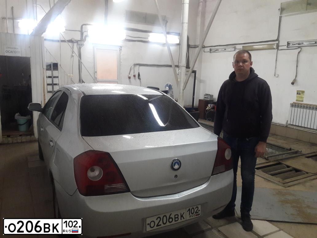 Фото автомобиля GEELY MK, 2012 — госномер Н565ОР702. Цвет: СЕРЕБРО