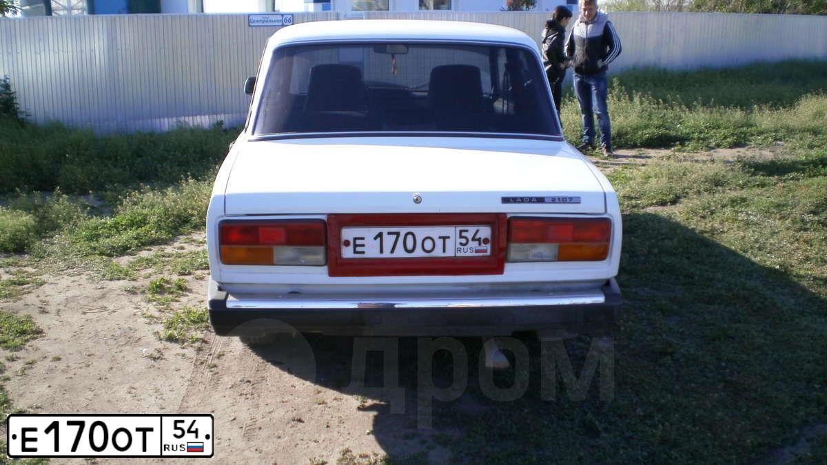 Фото автомобиля LADA 2107 LADA, 2004 — госномер Е711МЕ142. Цвет: СИНЕ ЗЕЛЕНЫЙ
