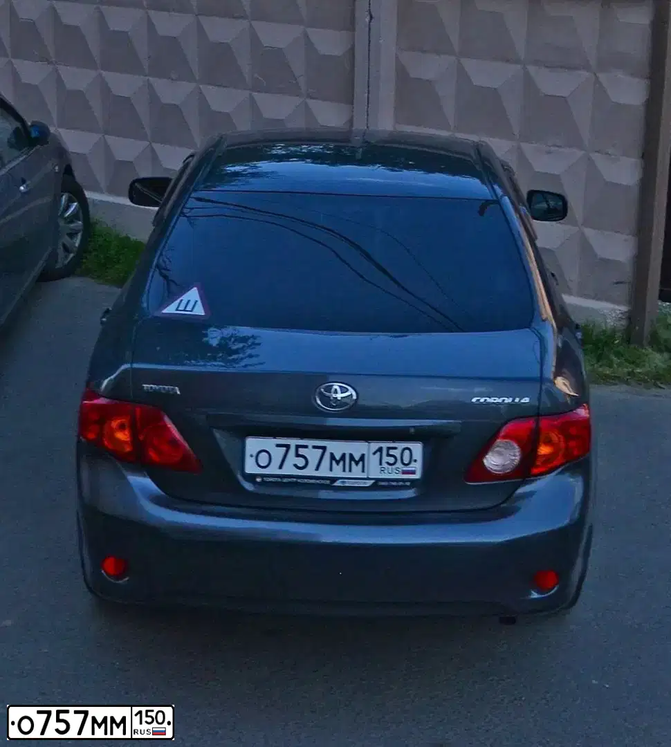 Фото автомобиля TOYOTA COROLLA, 2008 — госномер О757ММ150. Цвет: Серый