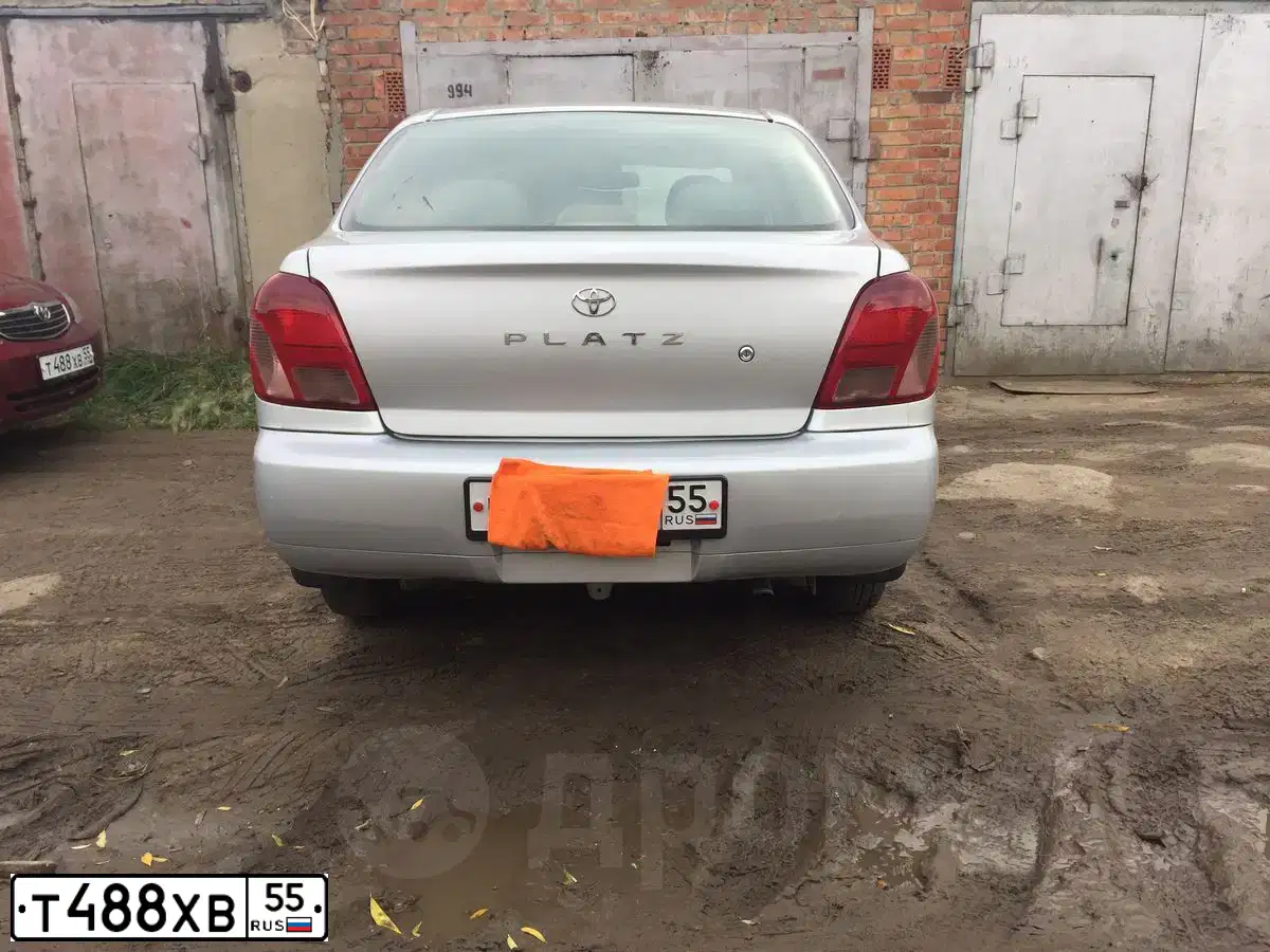 Фото автомобиля TOYOTA CAMRY, 2002 — госномер Р001МЕ55. Цвет: Красный