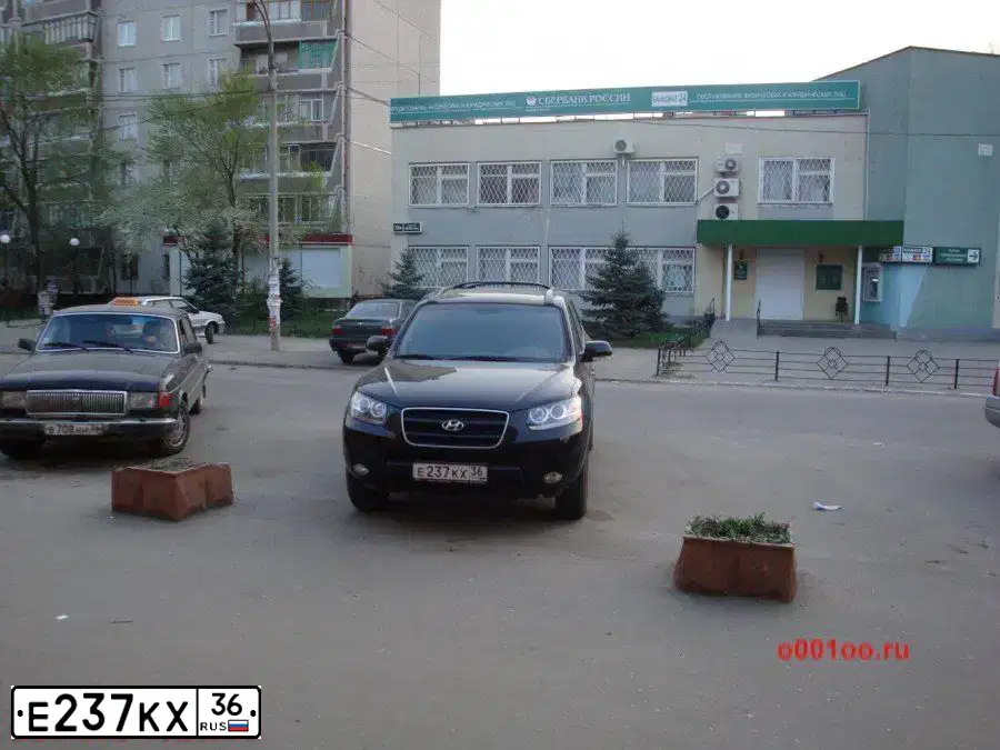 Фото автомобиля TOYOTA CAMRY, 2010 — госномер К212КХ36. Цвет: ЧЕРНЫЙ
