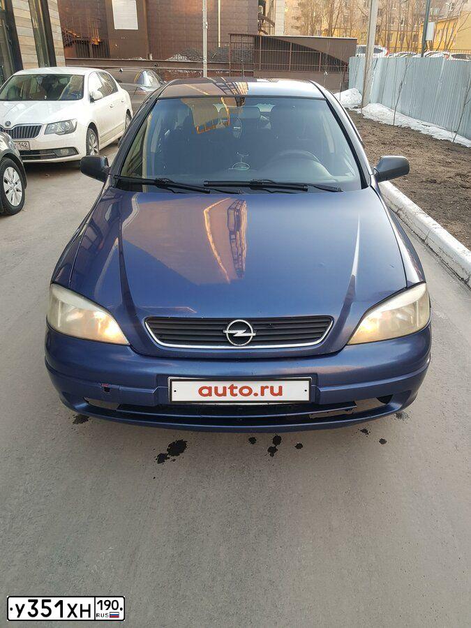 Фото автомобиля OPEL ASTRA, 1998 — госномер Е831УН33. Цвет: синий