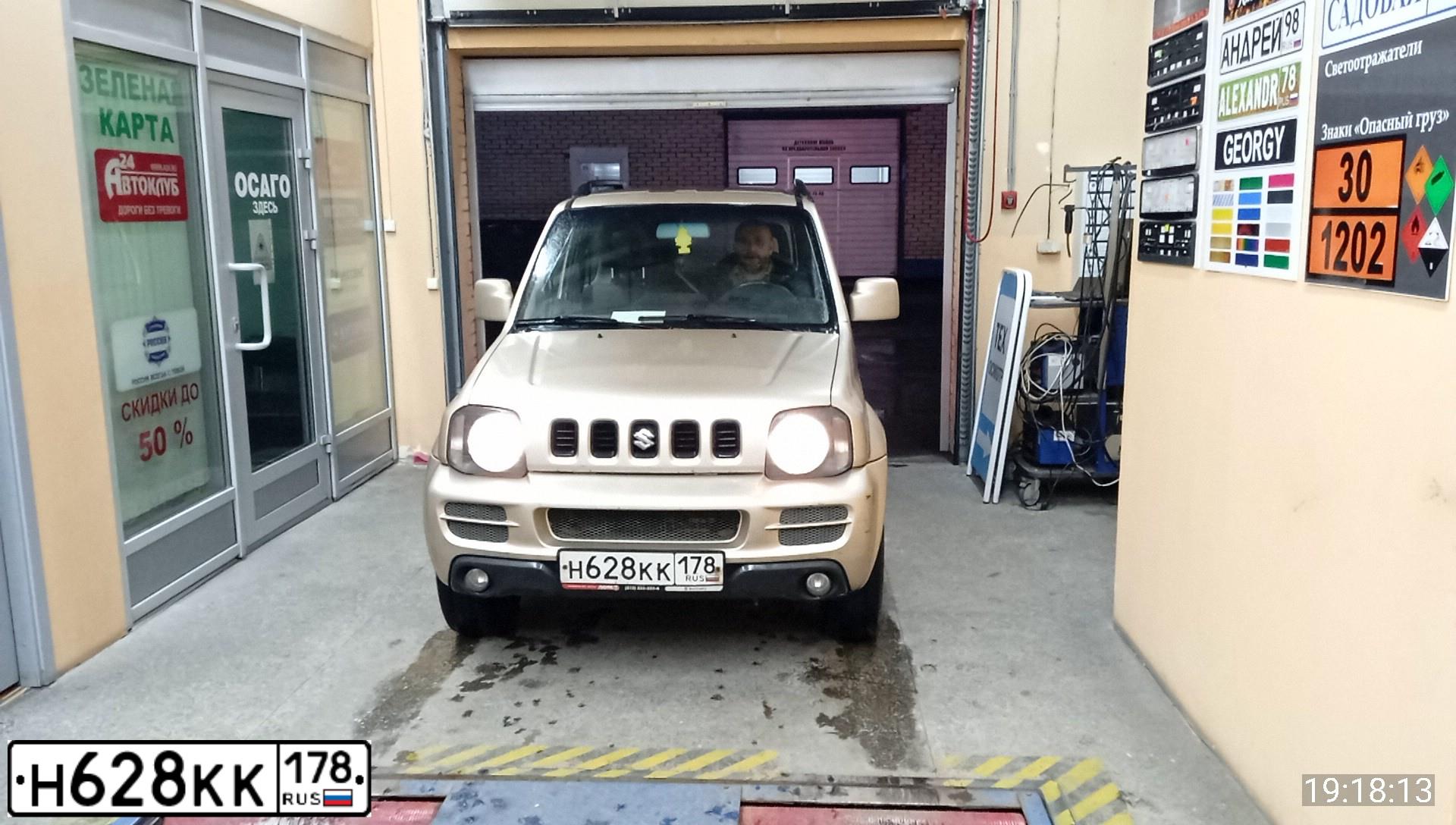 Фото автомобиля SUZUKI JIMNY, 2007 — госномер Н628КК178. Цвет: БЕЖЕВЫЙ