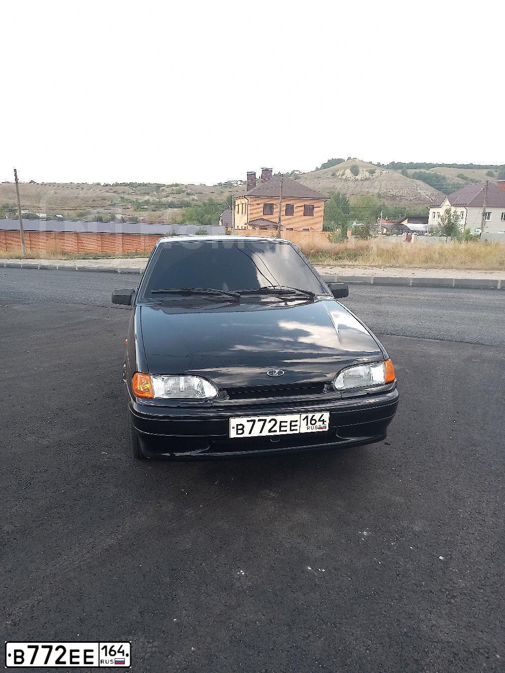 Фото автомобиля LADA 2114 SAMARA, 2010 — госномер М312ЕЕ164. Цвет: Темно-зеленый