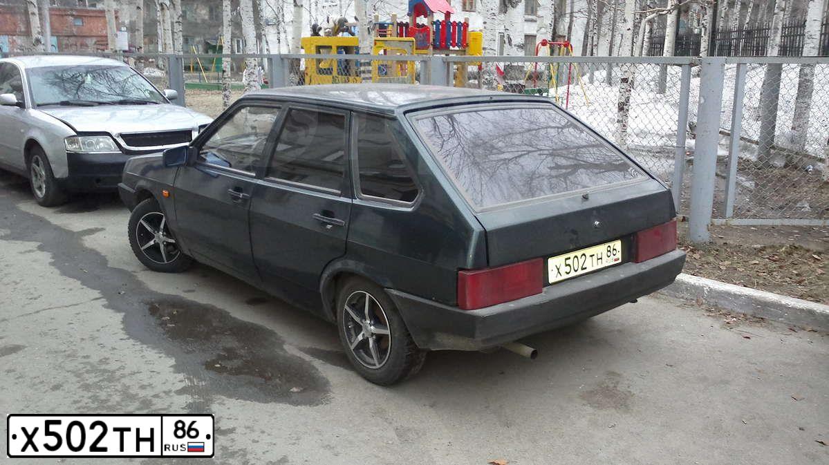Фото автомобиля LADA 2109 SAMARA, 2001 — госномер М331АЕ186. Цвет: Темно-зеленый