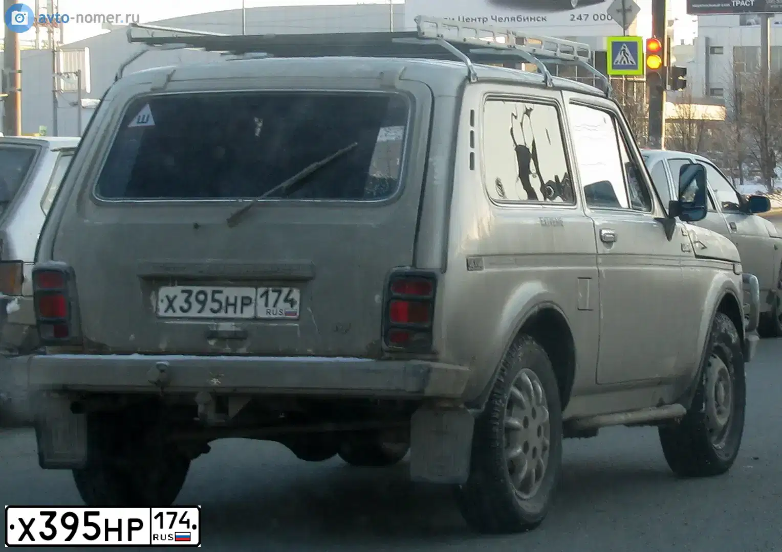 Фото автомобиля LADA NIVA, 1998 — госномер Е610АХ774. Цвет: ЯРКО-БЕЛЫЙ