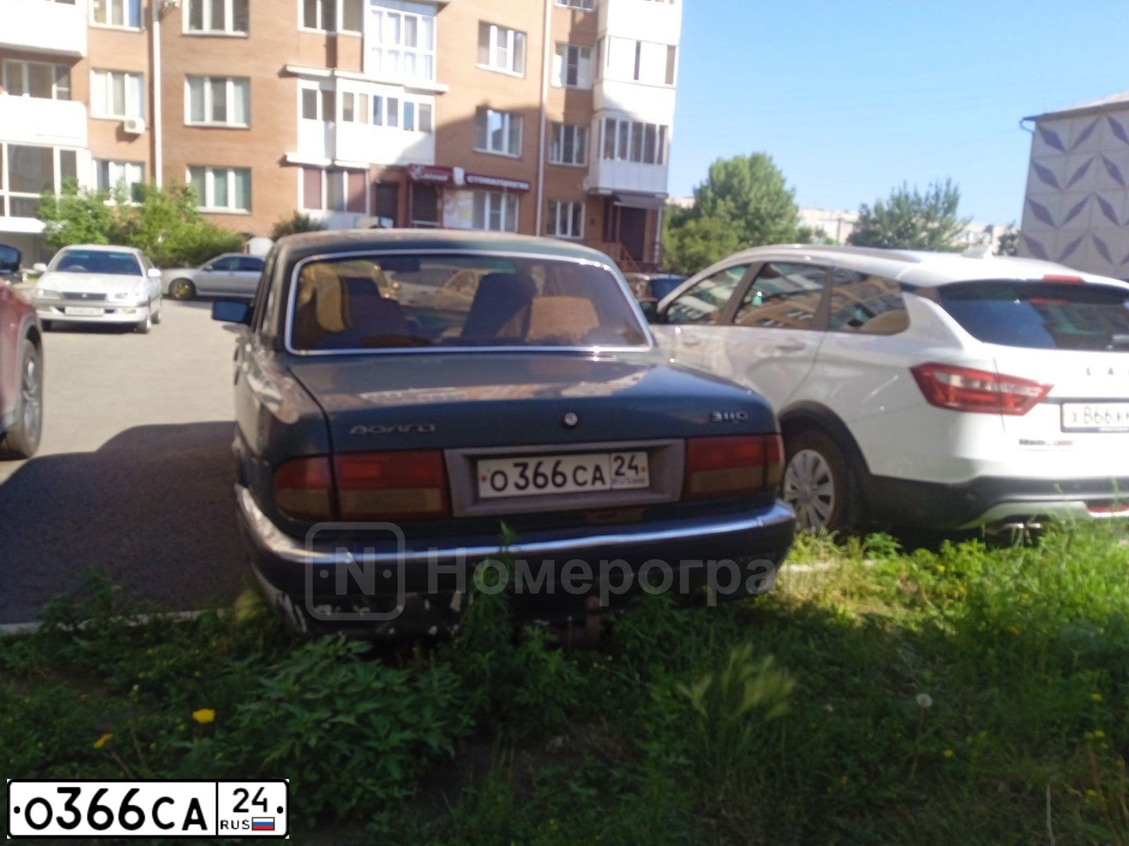 Фото автомобиля GAZ 3110 WOLGA, 2000 — госномер О366СА24. Цвет: ЗЕЛЕНЫЙ