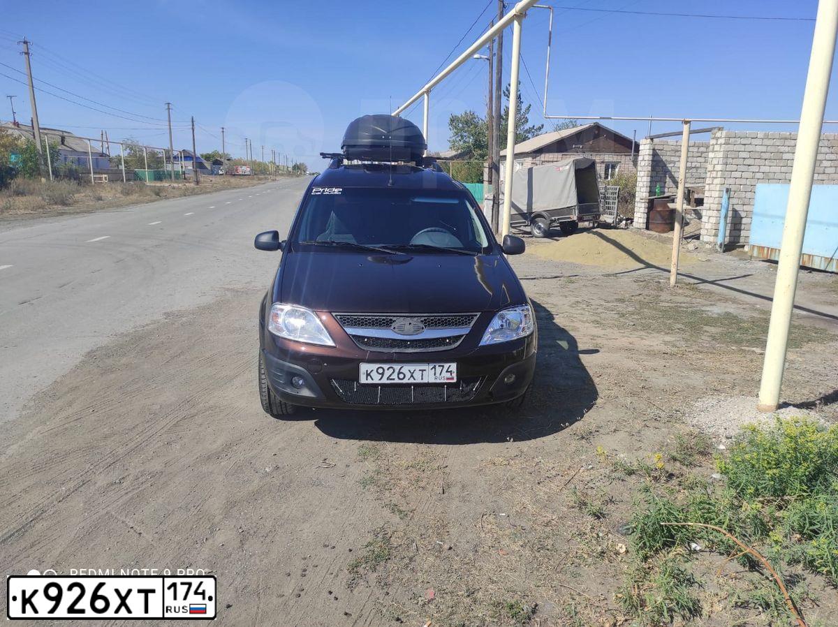 Фото автомобиля LADA LARGUS, 2018 — госномер К926ХТ174. Цвет: ТЕМНО-КОРИЧНЕВЫЙ