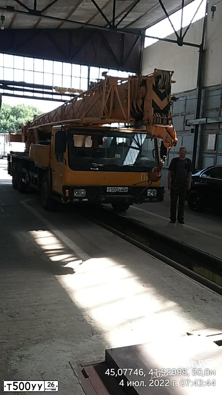Фото автомобиля XU GONG XCMG 5311, 2008 — госномер Т500УУ26. Цвет: ЖЕЛТО-ЧЕРНЫЙ