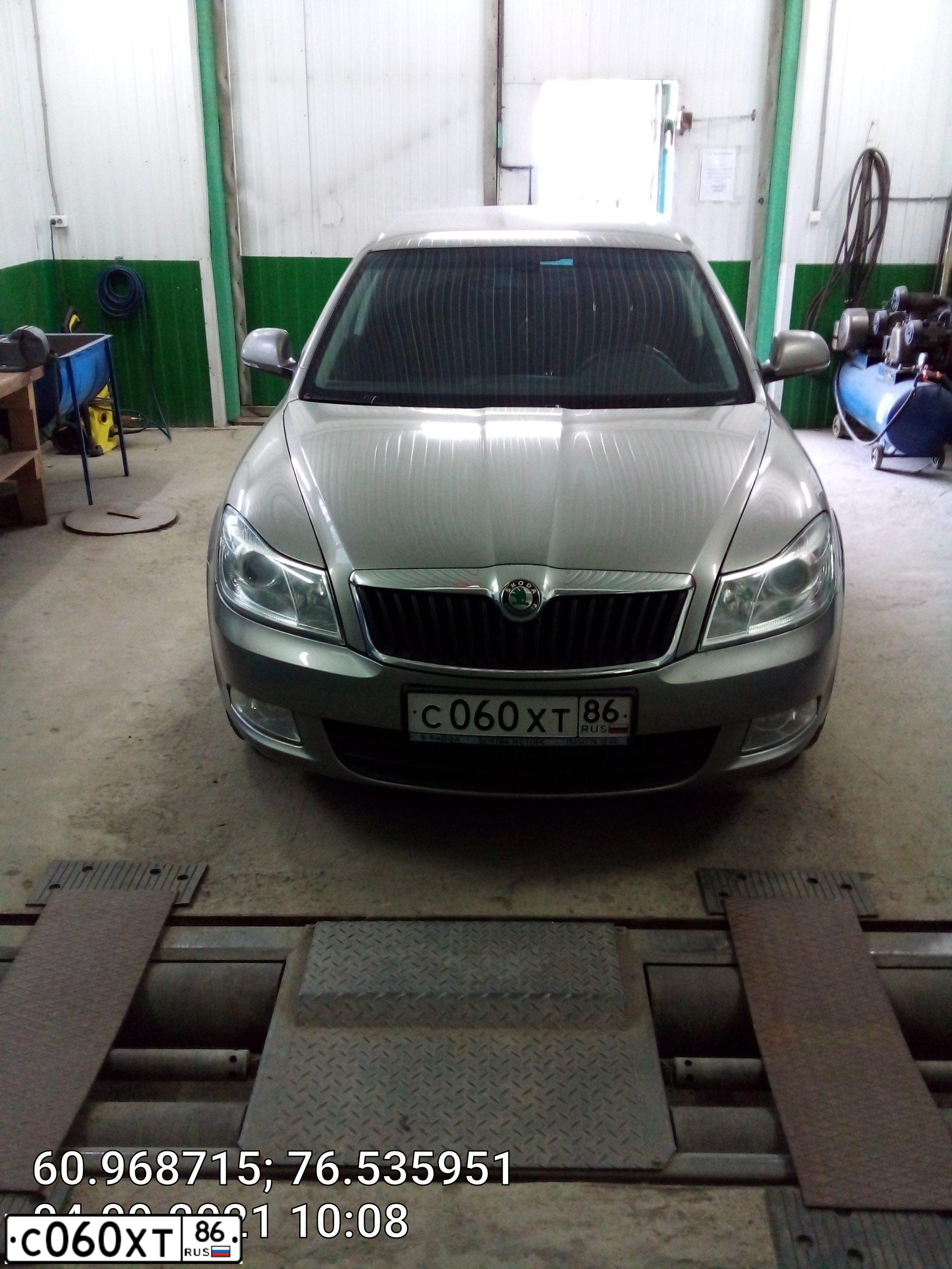 Фото автомобиля SKODA OCTAVIA, 2012 — госномер С060ХТ86. Цвет: БЕЖЕВЫЙ
