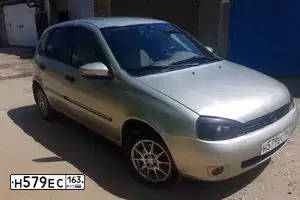 Фото автомобиля LADA 1119 KALINA, 2010 — госномер К582ЕО134. Цвет: БЕЛО-ЖЕЛТЫЙ ПЕРЛАМУТРОВЫЙ