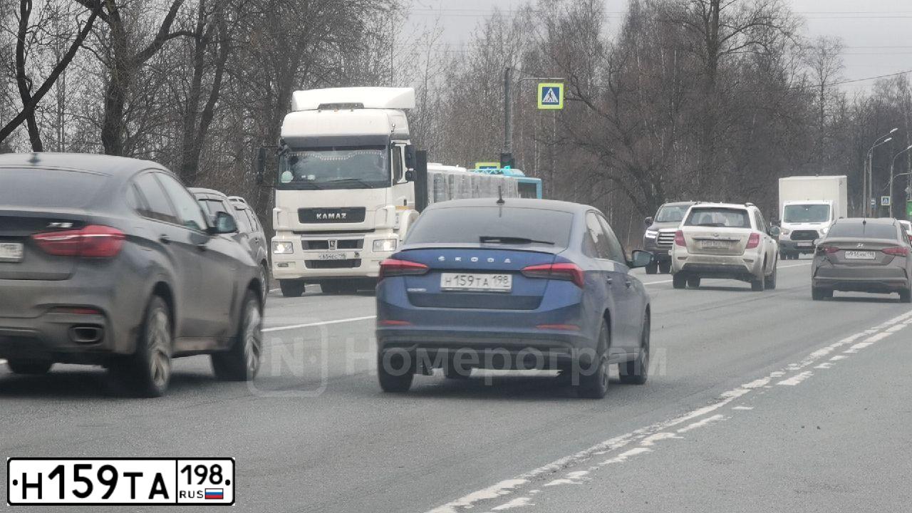 Фото автомобиля SKODA RAPID, 2020 — госномер К979РХ21. Цвет: Синий, черный