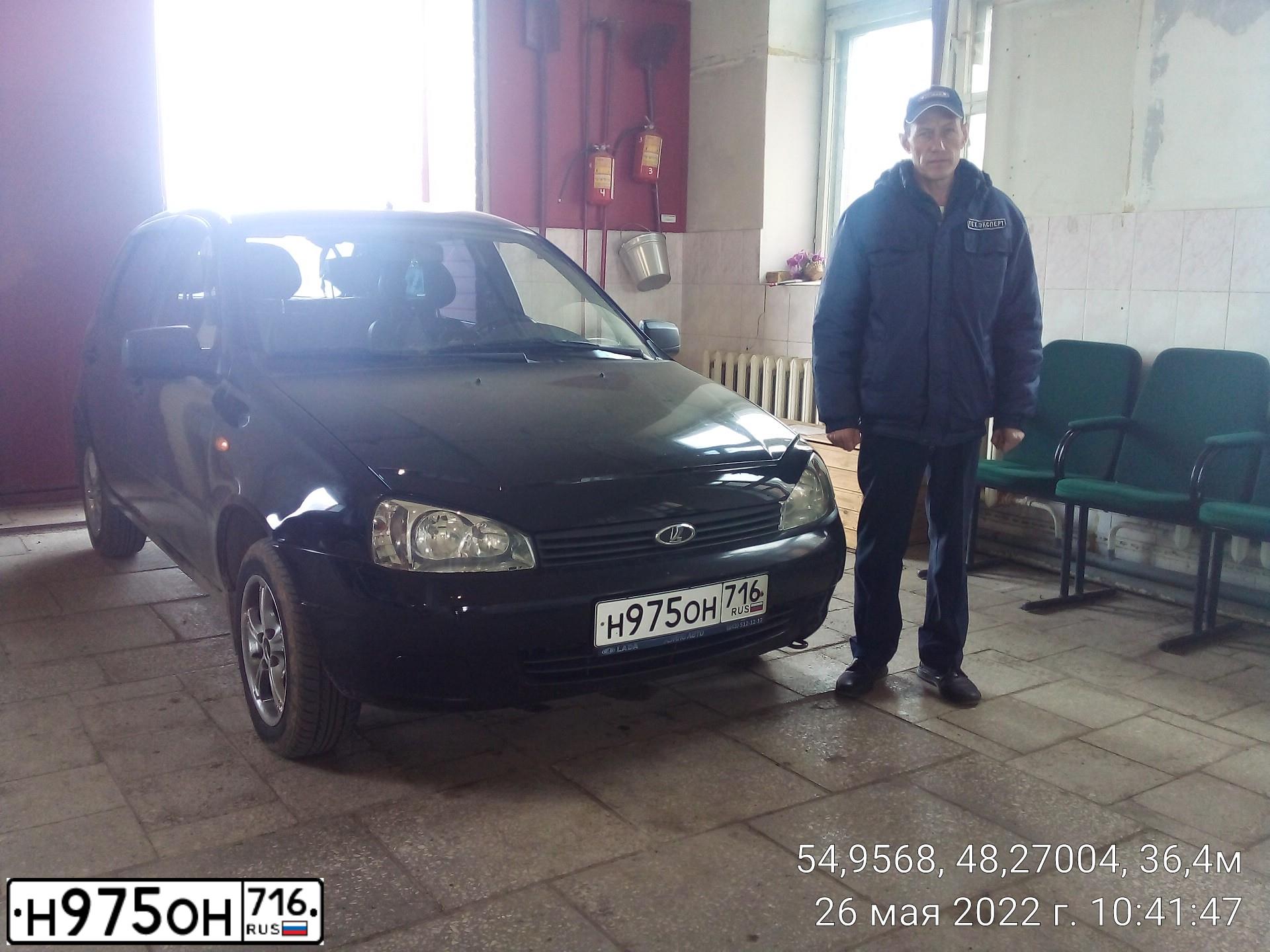 Фото автомобиля LADA KALINA, 2013 — госномер Н975ОН716. Цвет: Сине-Черный