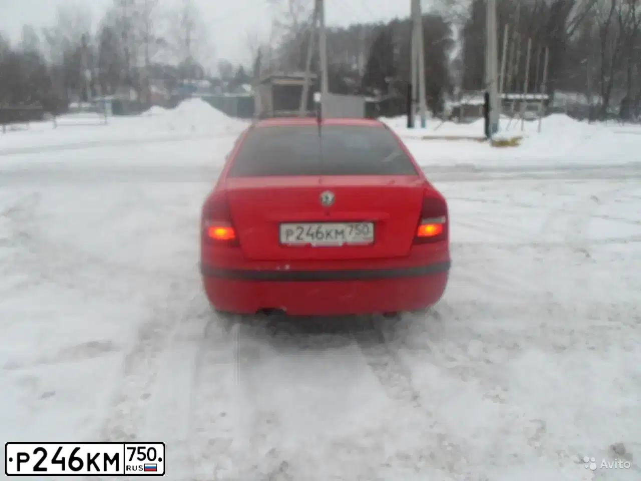 Фото автомобиля SKODA OCTAVIA, 2000 — госномер Р246КМ750. Цвет: Красный