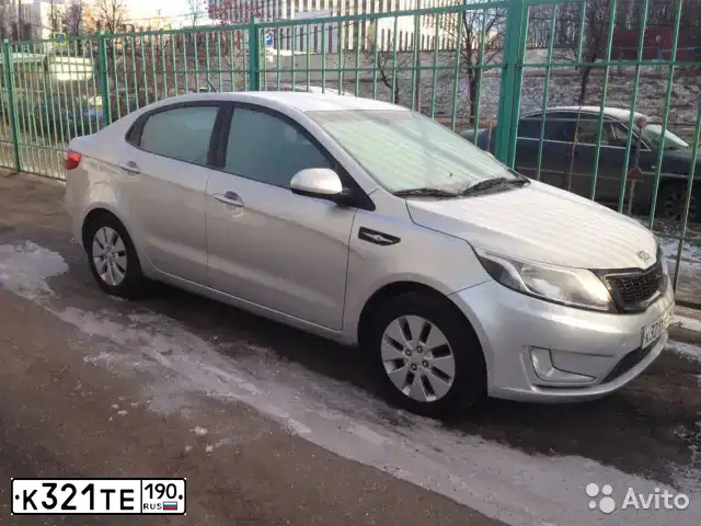 Фото автомобиля KIA RIO, 2012 — госномер Т018МТ31. Цвет: СЕРЫЙ