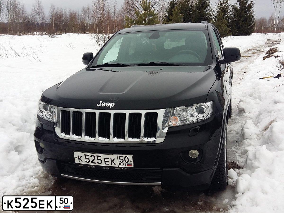 Фото автомобиля JEEP GRAND CHEROKEE, 2012 — госномер М198ОО134. Цвет: ЗЕЛЕНЫЙ ТЕМНЫЙ
