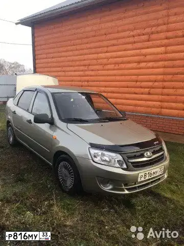Фото автомобиля LADA 2190 GRANTA, 2012 — госномер А399ЕН193. Цвет: СЕРО-БЕЖЕВЫЙ