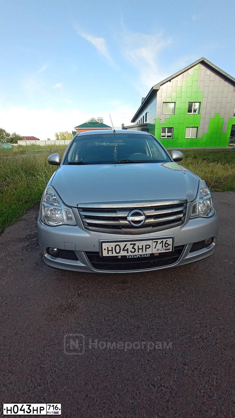 Фото автомобиля NISSAN ALMERA /AVTOVAZ/, 2015 — госномер М744НЕ124. Цвет: Серебристый