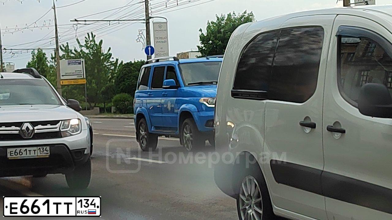 Фото автомобиля RENAULT DUSTER, 2019 — госномер Е661ТТ134. Цвет: СВЕТЛО-СЕРЫЙ