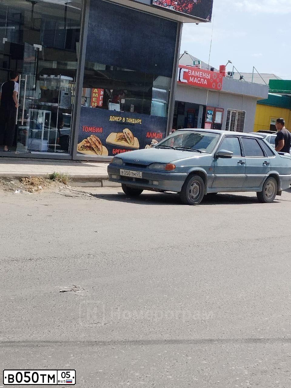 Фото автомобиля LADA 2115 SAMARA, 2003 — госномер В050ТМ05. Цвет: ЗОЛОТИСТЫЙ