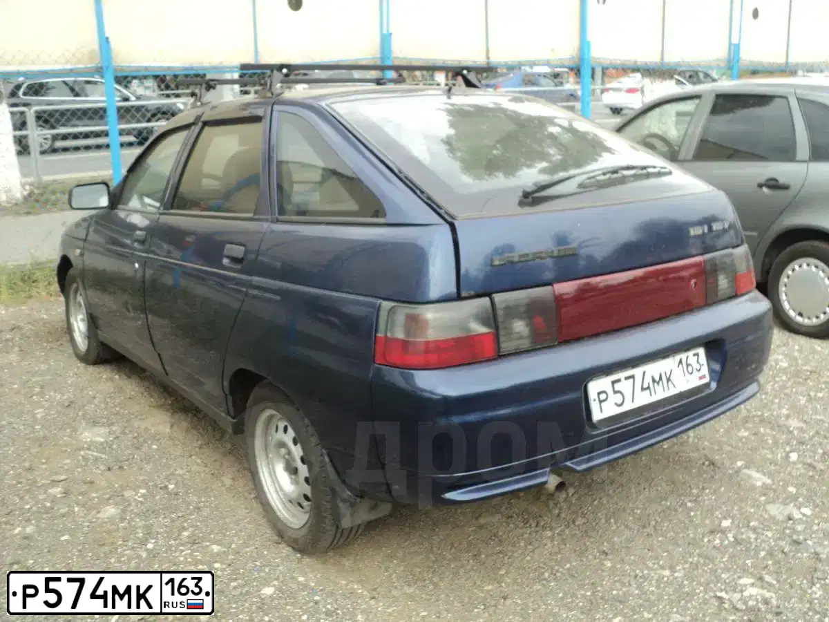 Фото автомобиля LADA 2112, 2005 — госномер Р574МК163. Цвет: СВЕТЛО-СЕРЕБРИСТЫЙ МЕТАЛЛ