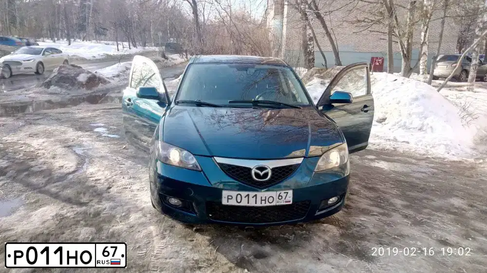 Фото автомобиля MAZDA A 3, 2007 — госномер С784ММ790. Цвет: сине-зеленый