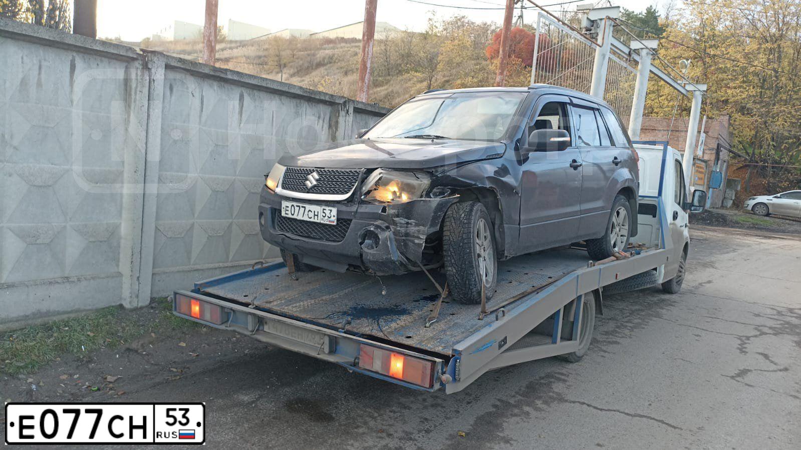 Фото автомобиля SUZUKI /GRAND/ VITARA, 2008 — госномер Е077СН53. Цвет: ЧЕРНЫЙ МЕТАЛЛИК