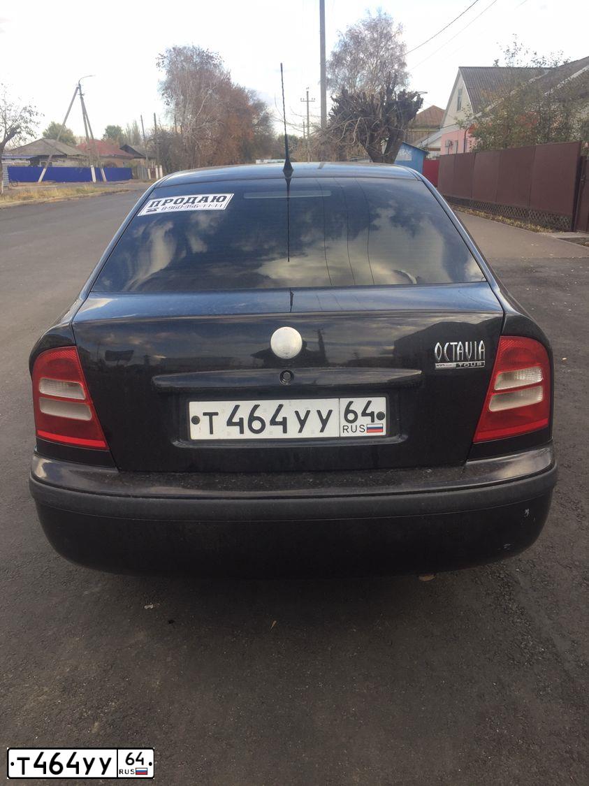 Фото автомобиля SKODA OCTAVIA, 2007 — госномер Т464УУ64. Цвет: ЧЕРНЫЙ