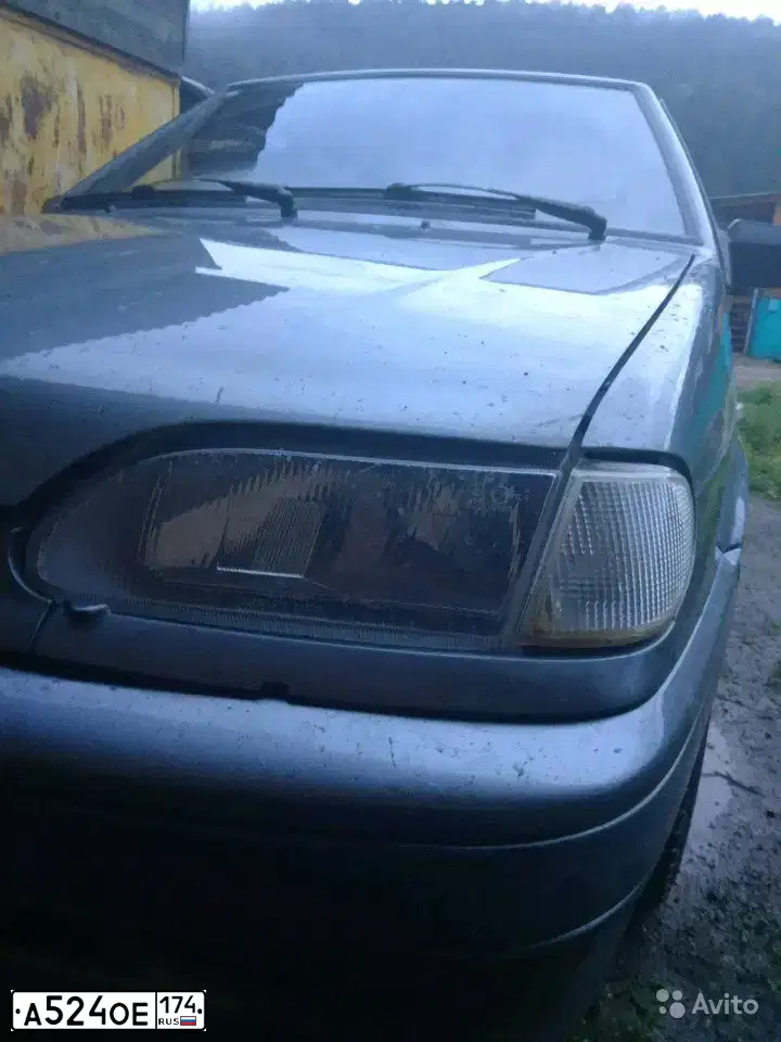 Фото автомобиля LADA 2114, 2006 — госномер Е995КМ774. Цвет: СЕРО-ЗЕЛЕНЫЙ