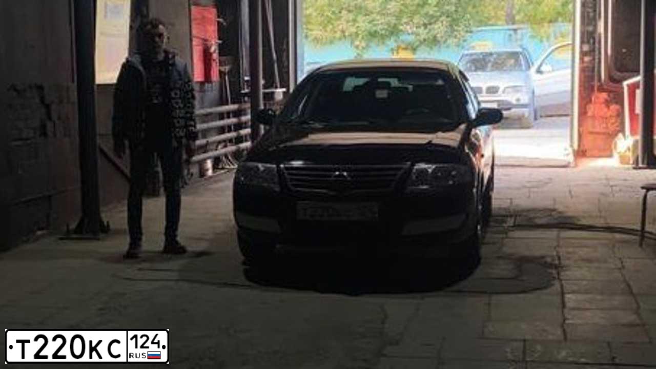 Фото автомобиля NISSAN ALMERA, 2006 — госномер Р145СН154. Цвет: ЧЕРНЫЙ
