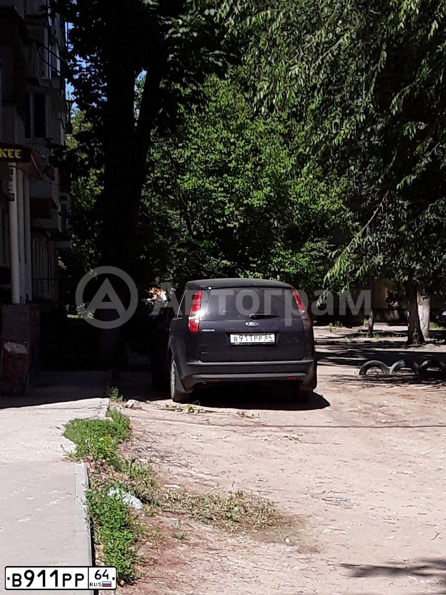 Фото автомобиля FORD FOCUS, 2007 — госномер В911РР64. Цвет: ТЕМНО СИНИЙ