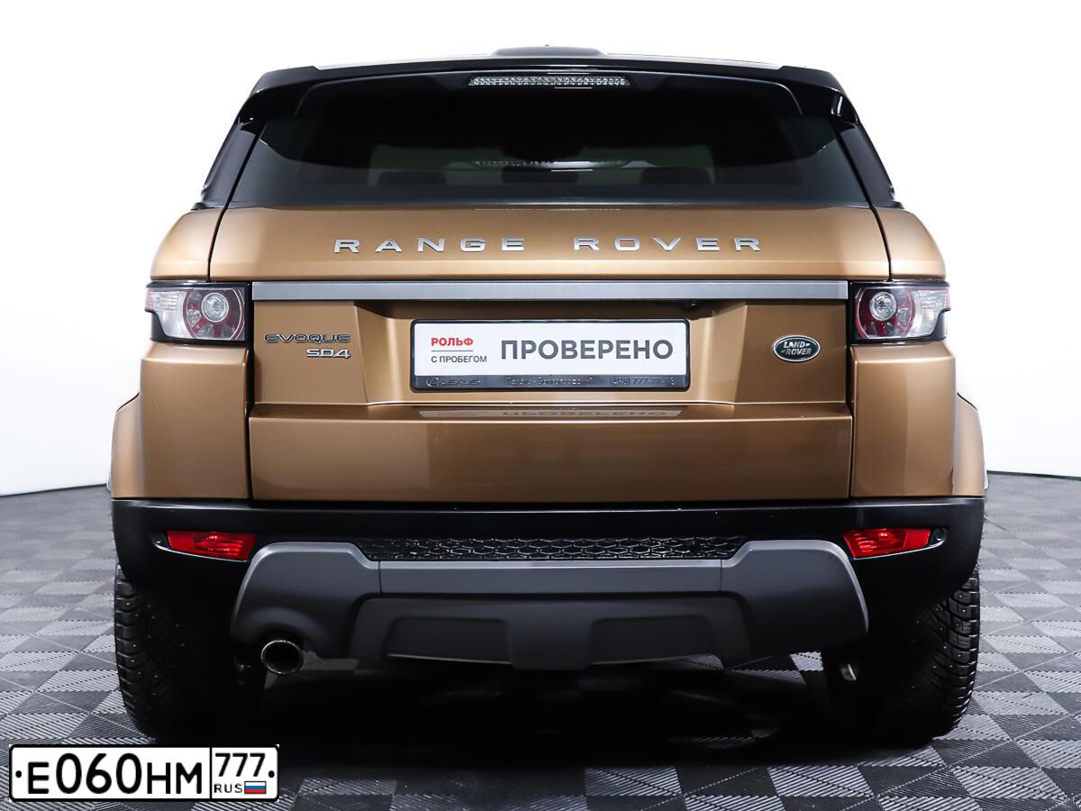 Фото автомобиля LANDROVER RANGE ROVER EVOQUE, 2014 — госномер Е060НМ777. Цвет: бронзовый черный