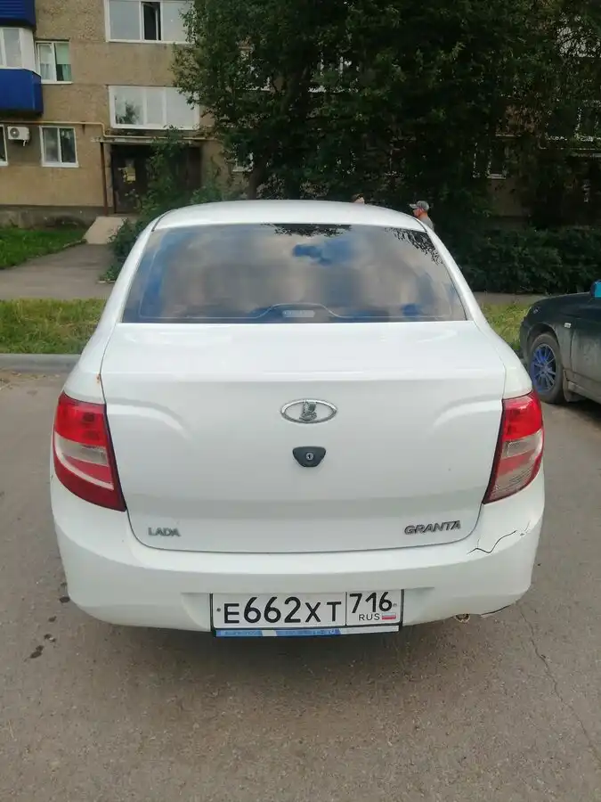 Фото автомобиля LADA 2190 GRANTA, 2012 — госномер С204УУ18. Цвет: Белый