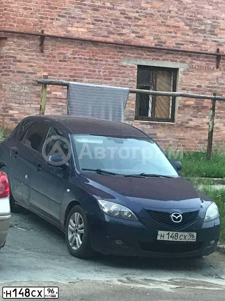 Фото автомобиля MAZDA 3, 2008 — госномер Н148СХ96. Цвет: ТЕМНО-СИНИЙ