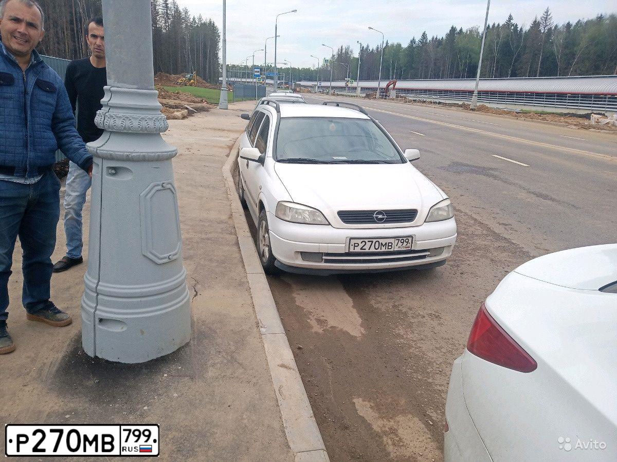 Фото автомобиля OPEL ASTRA, 1998 — госномер Р270МВ799. Цвет: Белый