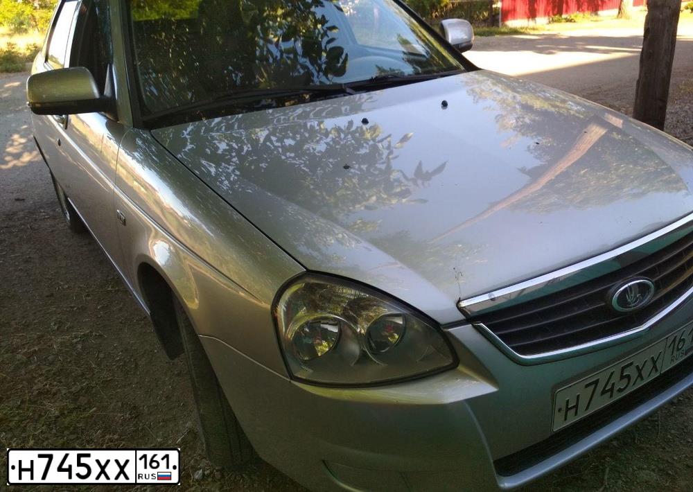 Фото автомобиля LADA 2172 PRIORA, 2009 — госномер К004ТВ82. Цвет: Светло-Серебристый металлик