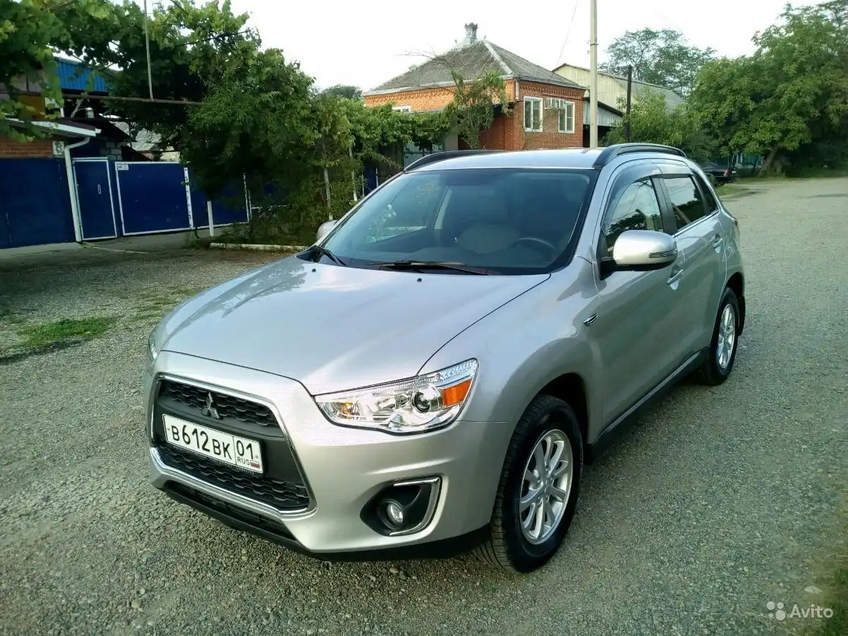 Фото автомобиля MITSUBISHI ASX, 2013 — госномер К551АЕ01. Цвет: серебристый