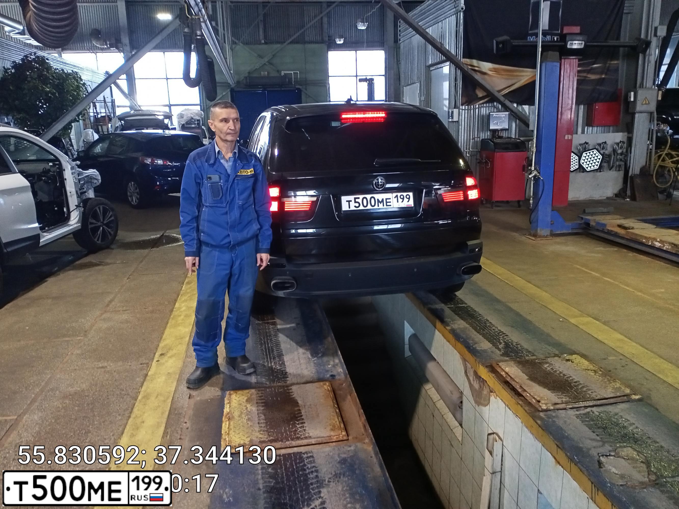 Фото автомобиля БМВ X5, 2009 — госномер Т500МЕ199. Цвет: ЧЕРНЫЙ