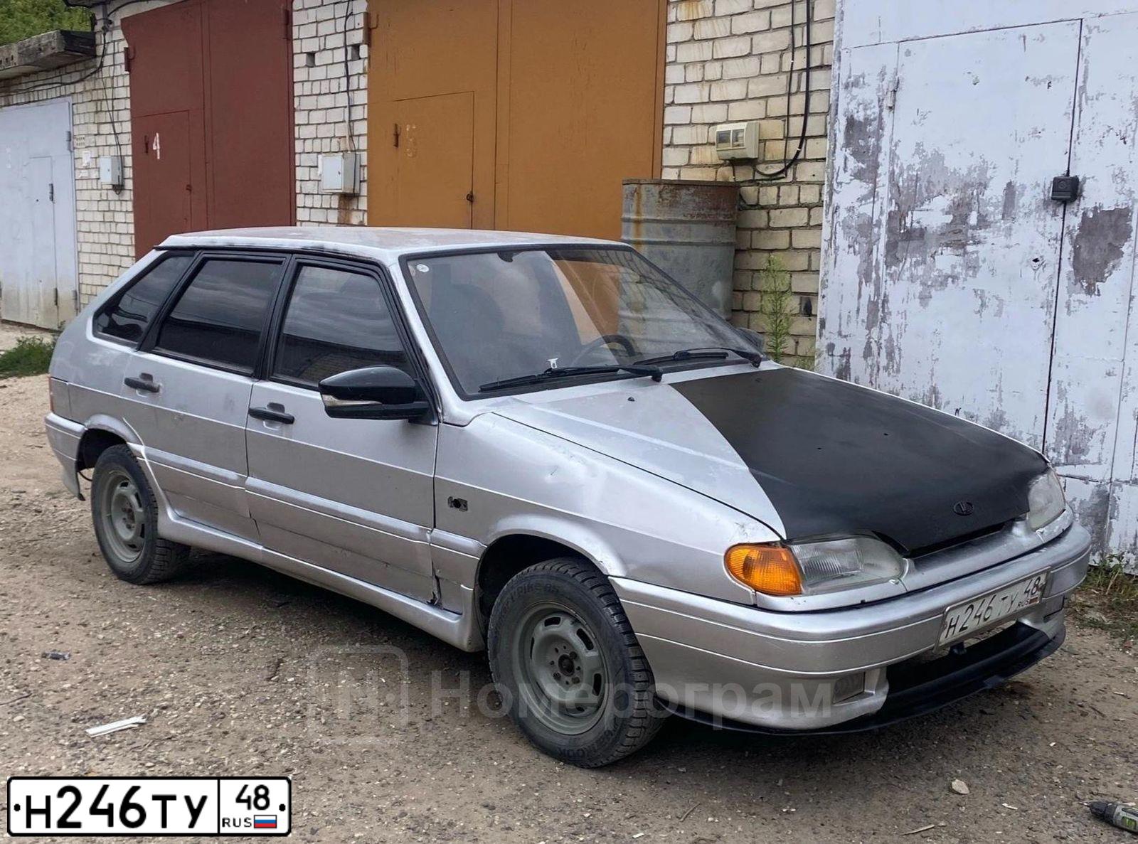 Фото автомобиля LADA 2114 SAMARA, 2003 — госномер Н246ТУ48. Цвет: СВЕТЛО-СЕРЫЙ