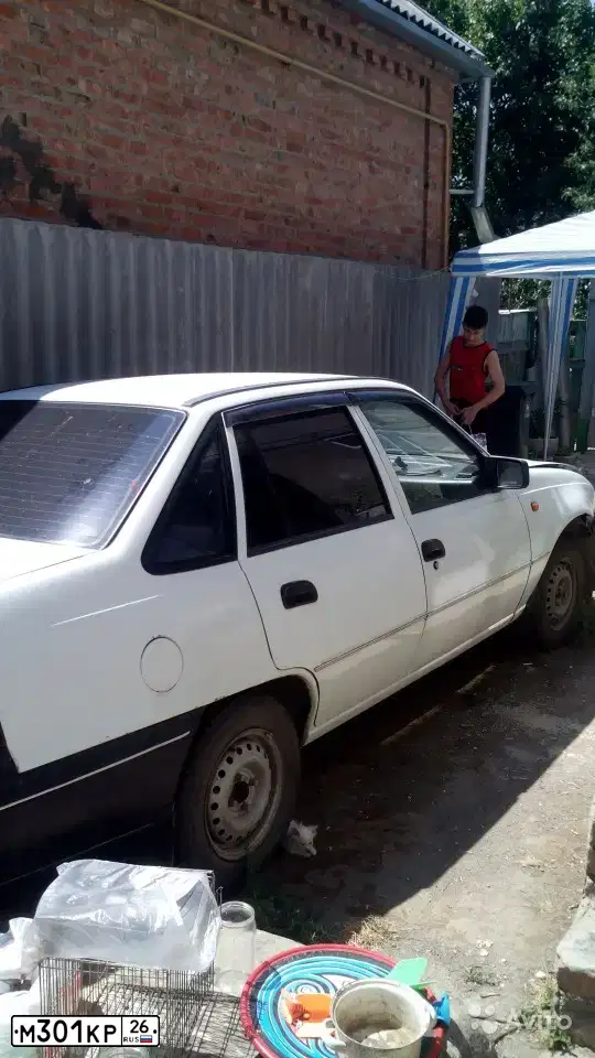Фото автомобиля DAEWOO NEXIA, 1997 — госномер М301КР26