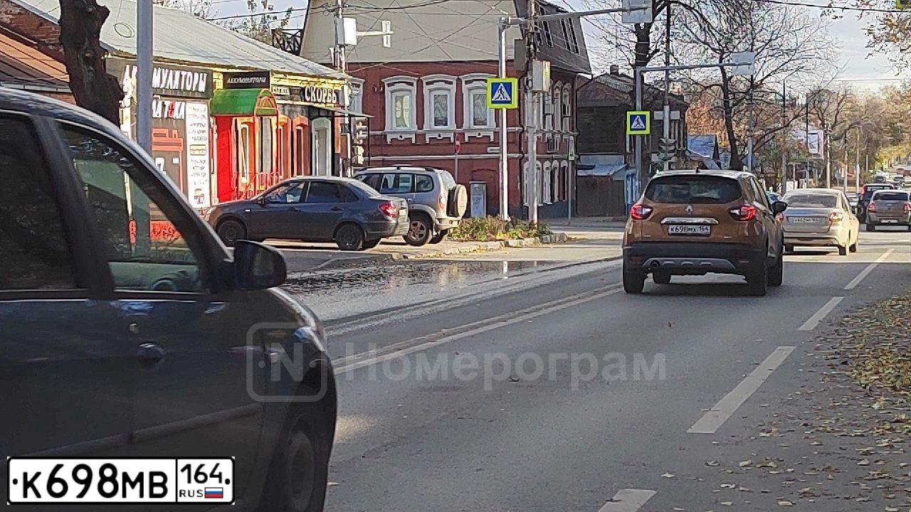 Фото автомобиля LADA 2114 SAMARA, 2005 — госномер В263ХР164. Цвет: МОЛОЧНО-БЕЛЫЙ СЕРЕБРИСТЫЙ