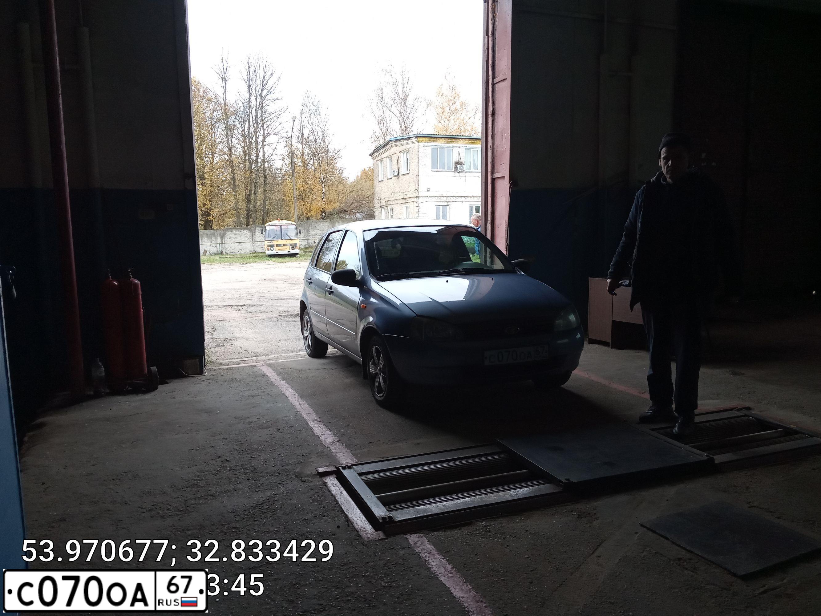 Фото автомобиля LADA 1119 KALINA, 2007 — госномер С070ОА67. Цвет: СЕРО-СИНИЙ