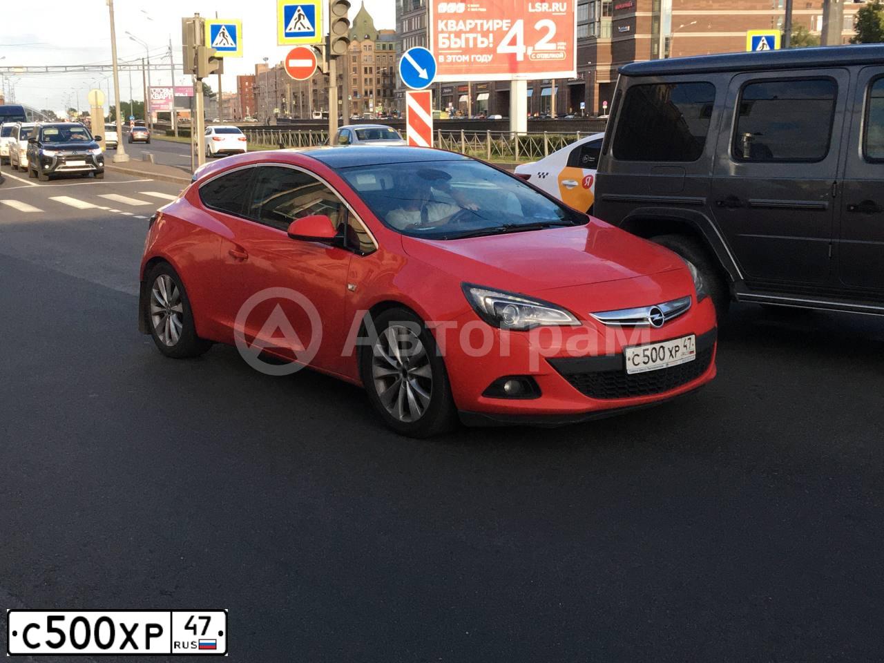 Фото автомобиля OPEL ASTRA, 2012 — госномер С500ХР47. Цвет: КРАСНЫЙ